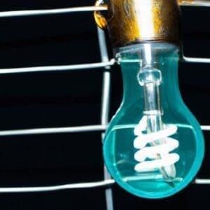 A light bulb hanging from a wire.