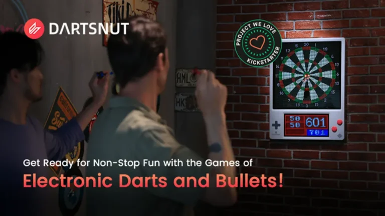 Two people engaged in an electronic throwing game of darts in a dimly lit room. A retro-inspired scoreboard displays a score of 601, while promotional text for "Electronic Darts and Bullets" is visible at the bottom.